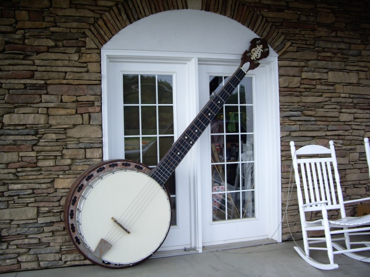 Giant banjo outside the entrance to The Music Outlet
